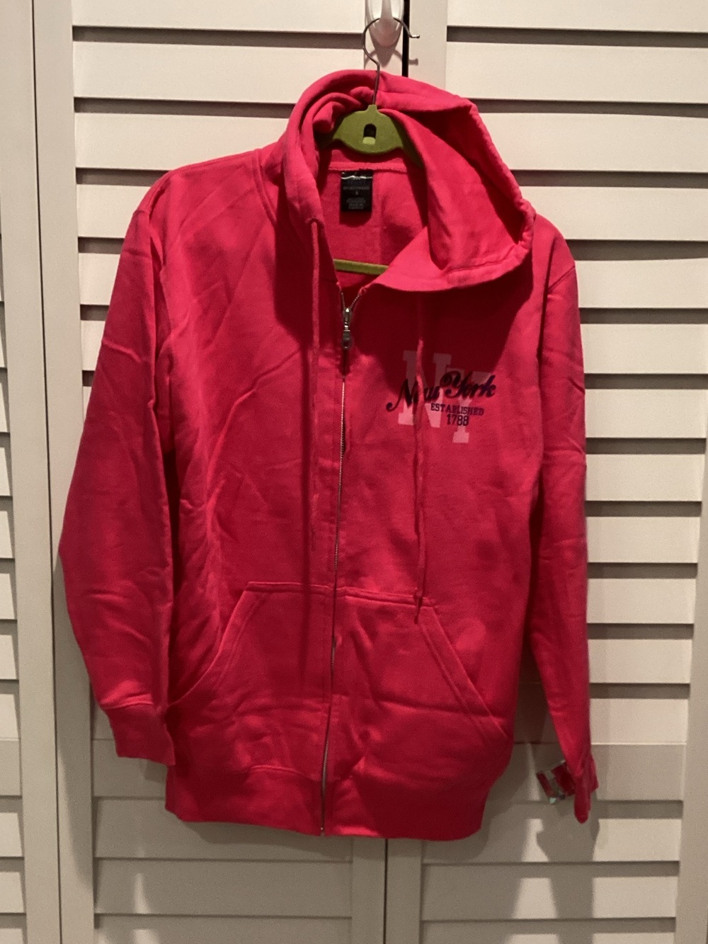 Women's Pink Full-Zip Hoodie with Subtle Logo in a Polyester/Cotton blend.